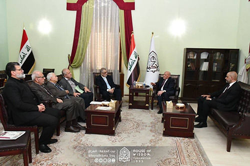 Professor Dr. Abdul Karim Al-Dabbagh, Professor Ali Hussein Mahfouz, and a group of researchers and academics